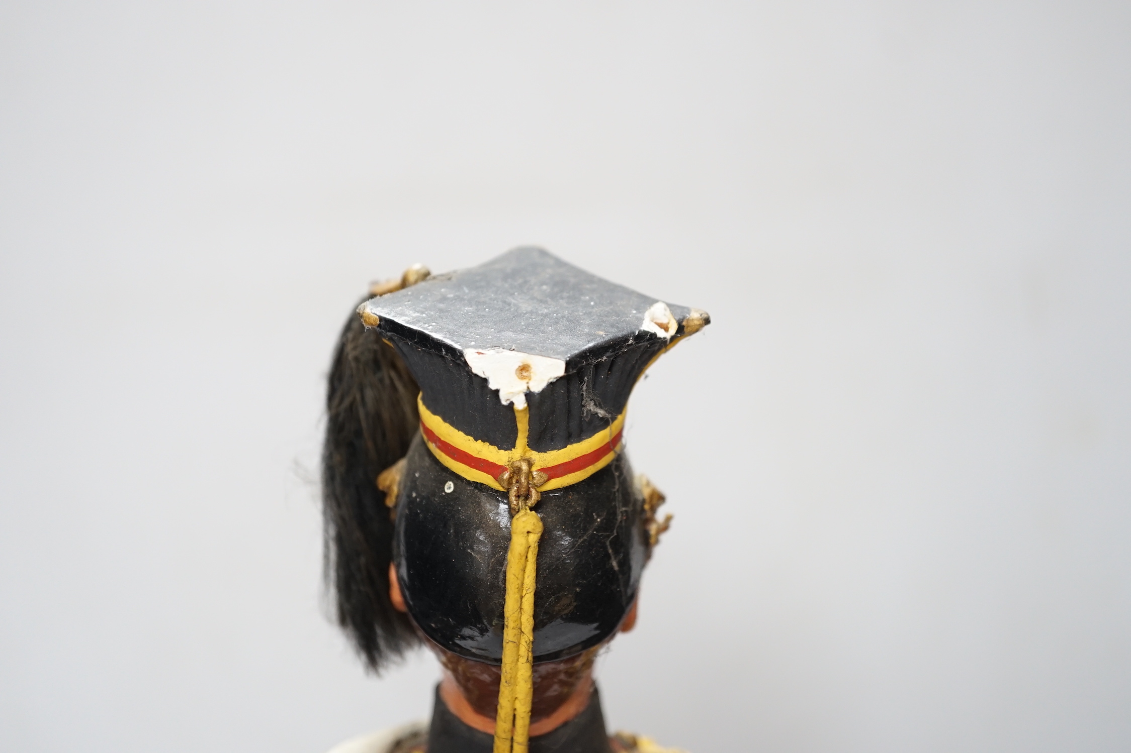 A painted plaster figure of a lancer, 48cm